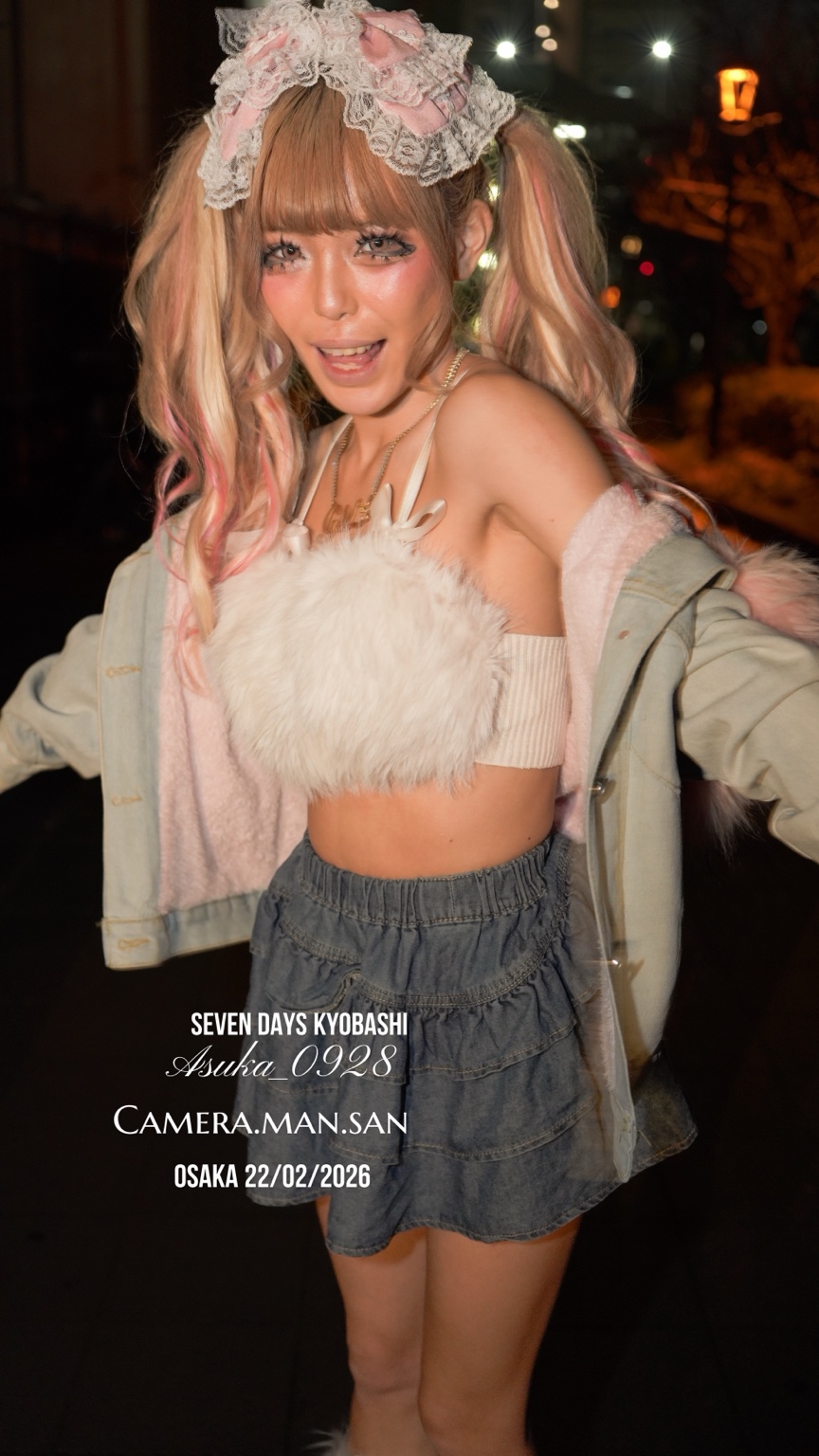 Night portrait in a white top and denim skirt
