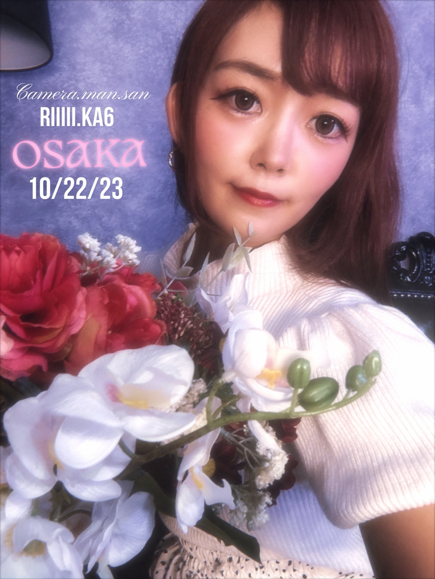 Close-up portrait holding a bouquet of flowers