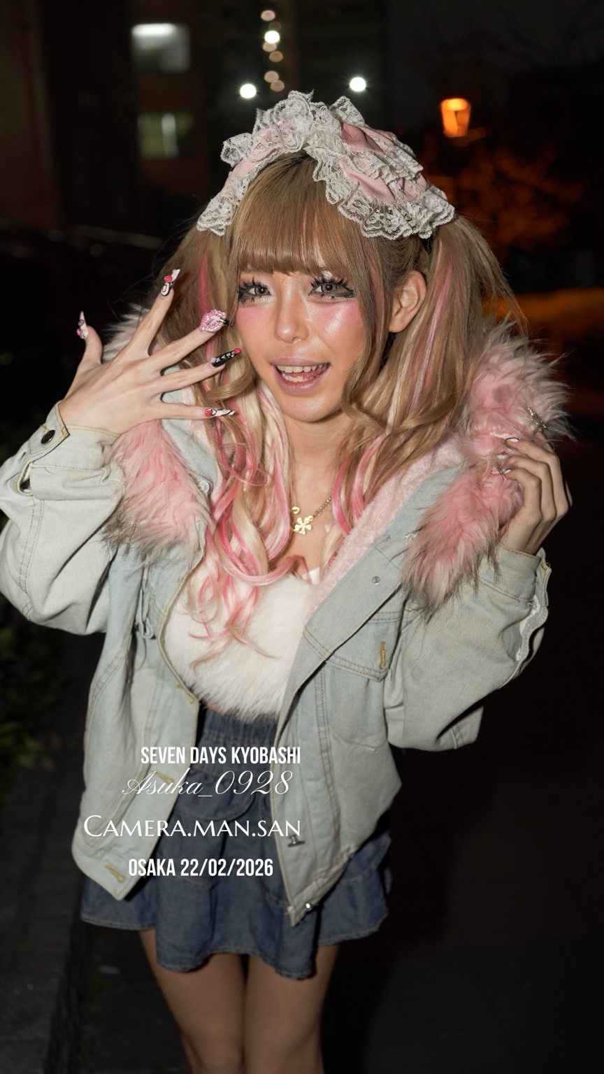 Portrait in a white jacket and floral headpiece at night